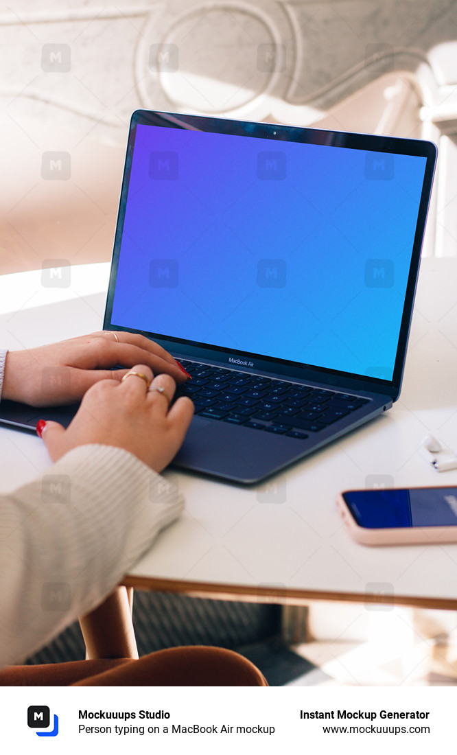 Person typing on a MacBook Air mockup