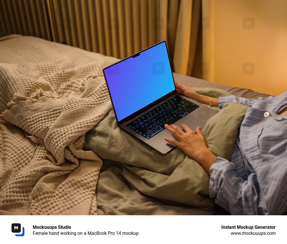 Female hand working on a MacBook Pro 14 mockup