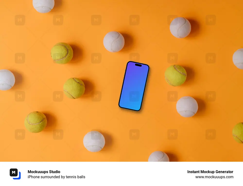iPhone surrounded by tennis balls