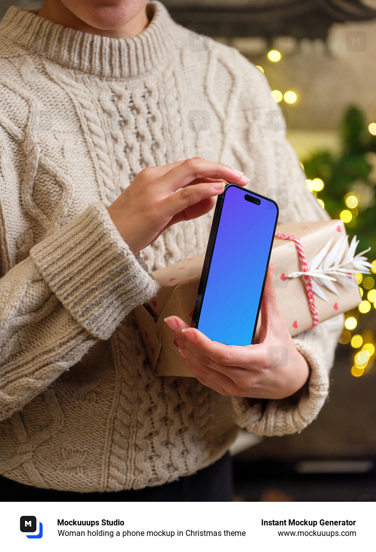 Woman holding a phone mockup in Christmas theme