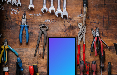 iPad Air mockup placed next to some work tools