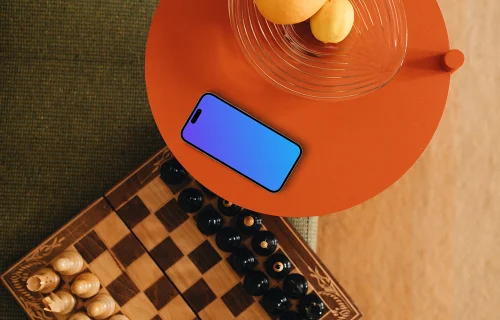 Chess board next to the iPhone mockup