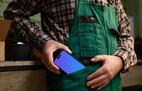 Crafter pulling out an iPhone from his pocket