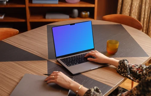 Female professional engaged in office work on MacBook Pro mockup