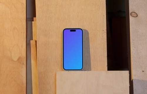 iPhone 14 Pro mockup placed on a wooden board