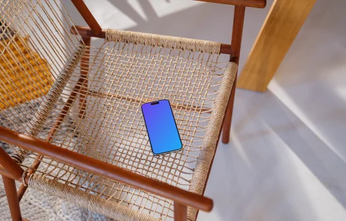 iPhone 15 Pro mockup on a modern woven chair