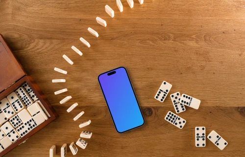 iPhone mockup in the middle of dominoes