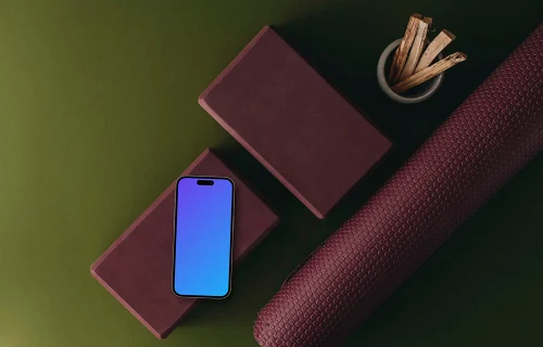 iPhone mockup with equipment for practicing yoga