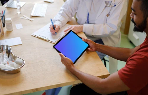 Patient holding an iPad Air in his hands