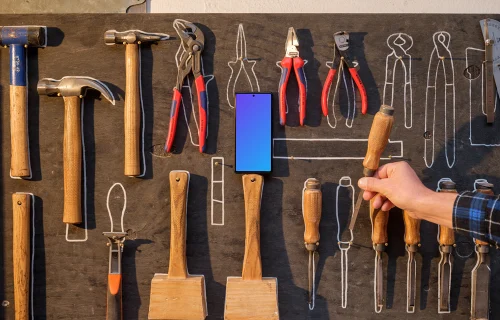 Phone mockup on the wall with tools