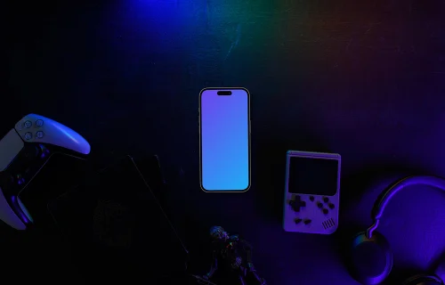 Smartphone mockup with gaming gadgets on dark background