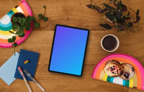 Tablet mockup with rainbow trays and a rainbow heart pin