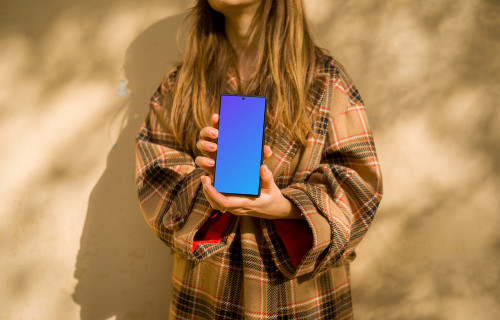 Woman holding a Google Pixel 6 mockup