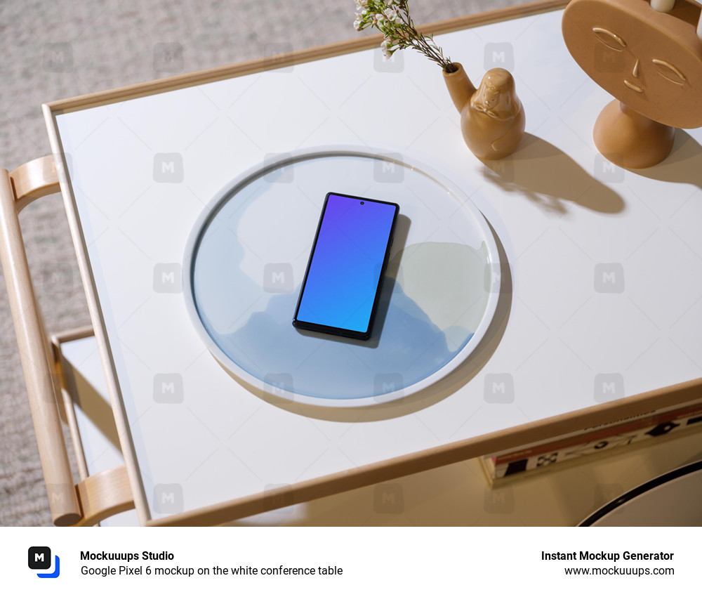 Google Pixel 6 mockup on the white conference table