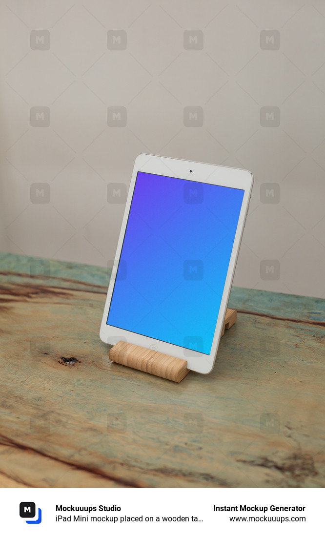 iPad Mini mockup placed on a wooden table in portrait mode