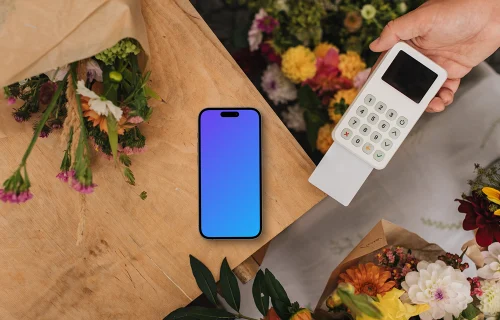 Card transaction in flower shop and an iPhone mockup