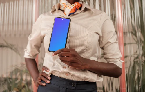 Female entrepreneur holding a Google Pixel mockup