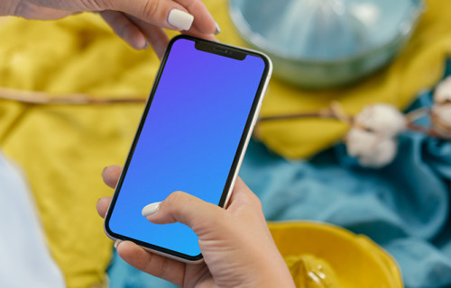 iPhone 12 Pro mockup held by user