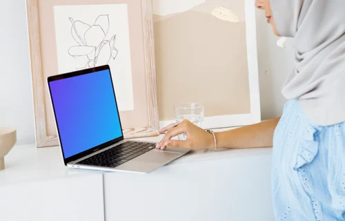 Lady using a MacBook Pro mockup