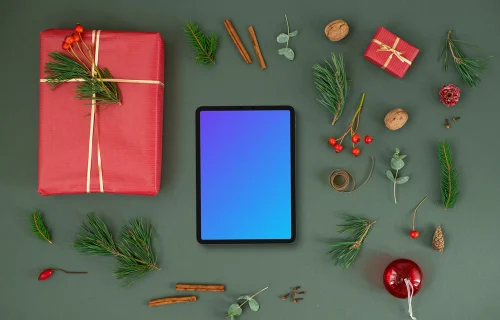 Top view of tablet mockup with christmas decoration