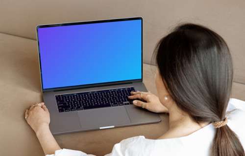 Woman typing on a Laptop mockup