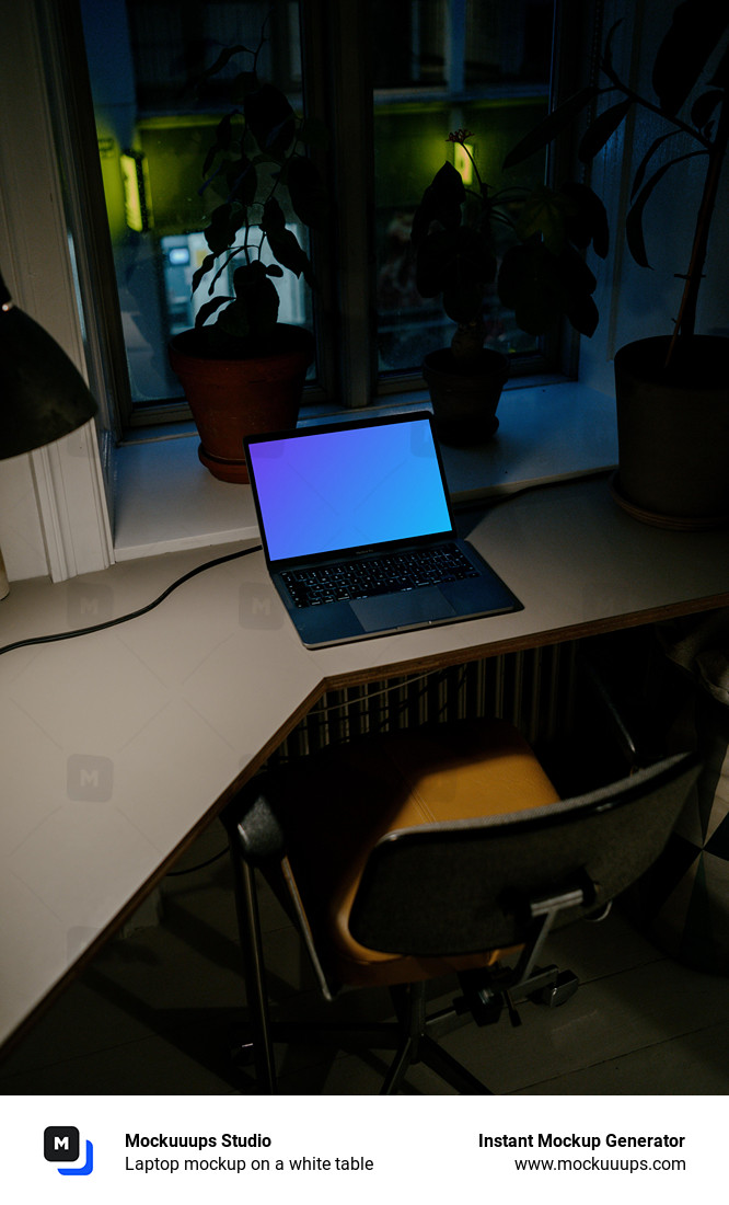 Laptop mockup on a white table