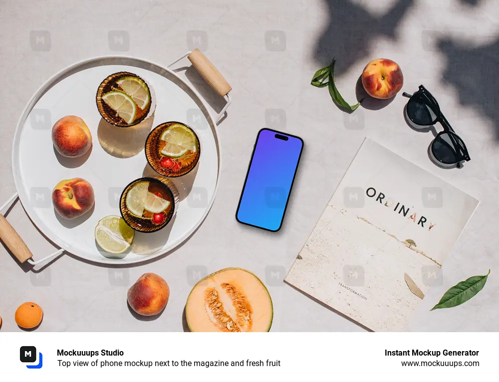 Top view of phone mockup next to the magazine and fresh fruit