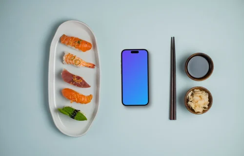 Nigiri sushi on a plate next to the Smartphone mockup