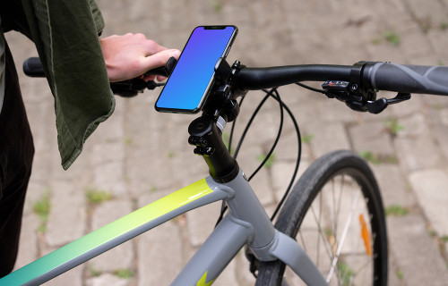 Sentado en una bicicleta con el iPhone Pro 11 mockup en el soporte para bicicletas