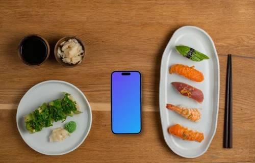 Smartphone mockup in the middle of sushi plates