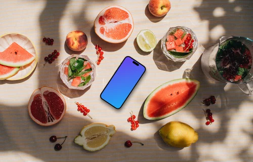 Smartphone mockup with a watermelon on the table