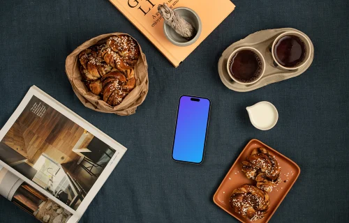 Smartphone mockup with coffee and pastries
