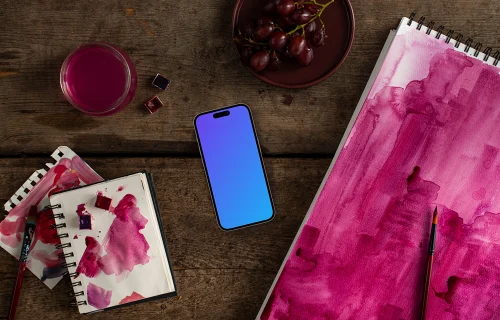 Smartphone with watercolor painting in Viva Magenta shade