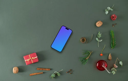 Top view of phone mockup with christmas background