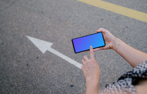 Woman hand pointing on a Google Pixel 6 mockup