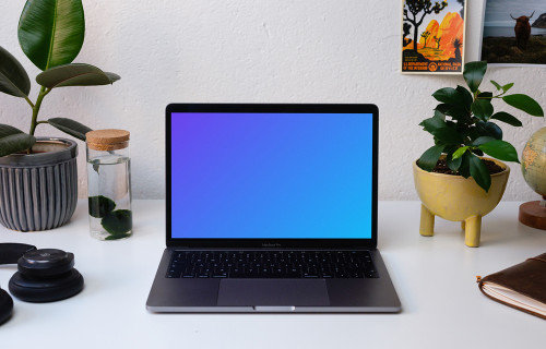 Front view of the Macbook Pro mockup on white table