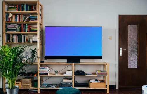 Televisión mockup en un soporte de mesa de madera