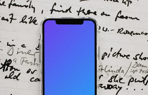 iPhone 12 Pro mockup on paper with handwritten text